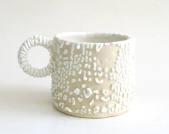 hand built porcelain cup  ...  white crawl glaze  ...  hand made espresso mug  ...   melting snow and ice