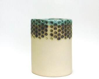 hand built porcelain vessel   ...   lots of dots