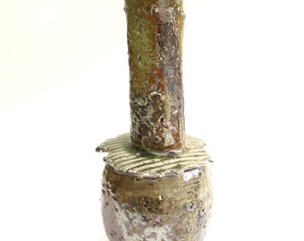hand thrown and altered stoneware bottle vessel  ...  wood soda fired  ...   minimal abstract handmade ...  mid century influence