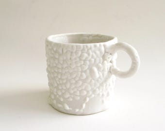 hand built porcelain cup  ...  white crawl glaze  ...  hand made espresso mug  ...   snow and ice