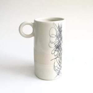 handmade hand built porcelain cup  ...  abstract scribble ceramic mug   ...   mid century modern tall espresso  cup  .... expressionism