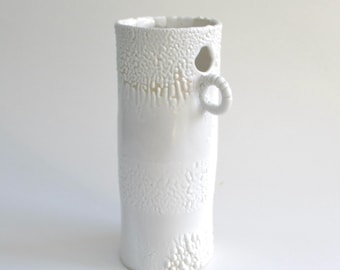 hand built porcelain vessel   ...  white crawl glaze  ...  hand made vase  ...  mid century modern ... melting  snow and ice