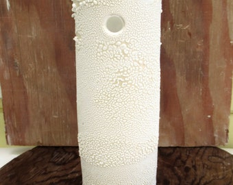 hand built porcelain vessel  ...  white crawl glaze  ....   snow and ice vase