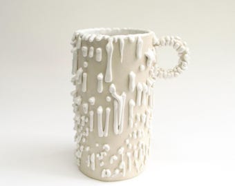 hand built porcelain cup  ...  white crawl glaze  ...  hand made petite  mug  ...   snow and ice melting