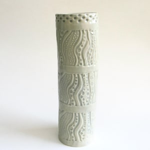 tall narrow  porcelain modern vase  ...  textured hand built ceramic column vessel  ... pale celadon glaze  ...  elegant statement container