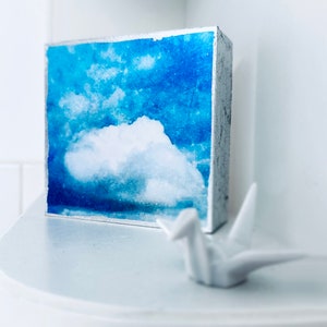 Small cloud art gifts for hostess gift, thank you gift, get well gift, teacher appreciation gift, art gift, housewarming gift. Bright blue and white cloud art decor for shelves and small spaces; Cloud art with silver linings, edged in silver leaf