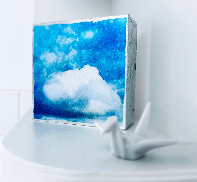 Small cloud art gifts for hostess gift, thank you gift, get well gift, teacher appreciation gift, art gift, housewarming gift. Bright blue and white cloud art decor for shelves and small spaces; Cloud art with silver linings, edged in silver leaf