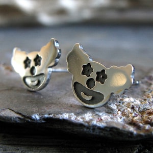 Clown face stud earrings handmade in sterling silver