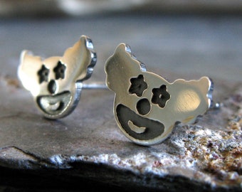 Clown face stud earrings handmade in sterling silver