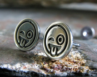 Tongue out winking emoji stud earrings handmade in sterling silver