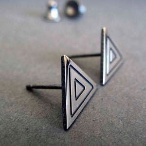 Boho concentric triangle stud earrings. Artisan handmade in sterling silver.