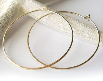 Minimalist thin 1 3/8&quot; 20 gauge hoops available in sterling silver or gold-filled