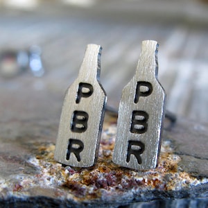 Tiny beer bottle stud earrings handmade in sterling silver