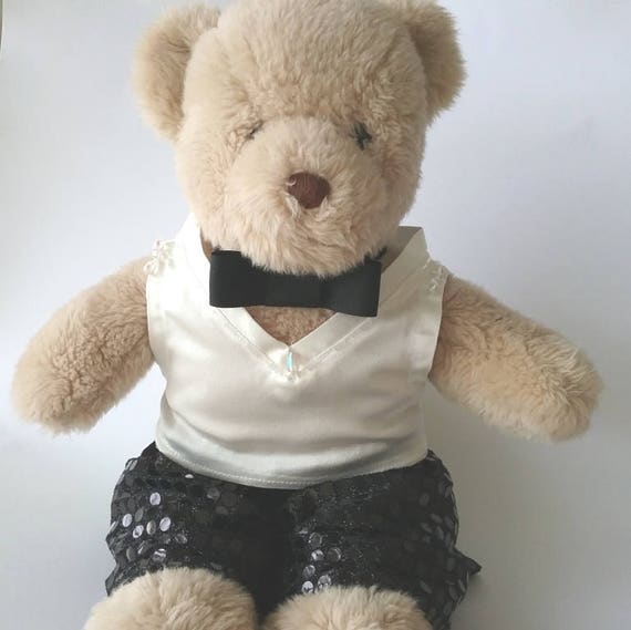teddy bear wearing clothes