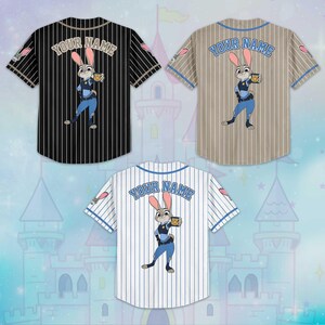 May include: Three baseball jerseys with pinstripes and the text "YOUR NAME". Each jersey features a cartoon rabbit character in a police uniform. The jerseys are black, tan, and white with blue accents.