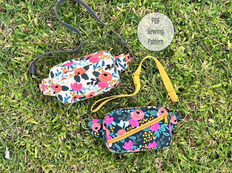 Puede incluir: Dos ri&ntilde;oneras de estampado floral con correas ajustables. Las ri&ntilde;oneras son de diferentes combinaciones de colores. Una es blanca con flores rosas y naranjas y la otra es negra con flores rosas y amarillas.  Patr&oacute;n de costura PDF.