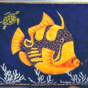 May include: A colorful, hand-painted artwork featuring a large yellow and orange fish with a patterned body, a small green turtle, and a red seahorse. White coral and bubbles are also depicted against a dark blue background, framed with a gold border.