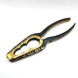 1950s Nutcracker: Brass Decorative Floral Scrolling Kitchenware