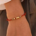 Tibetan Five-Colors Red String Bracelet with Gold Beads, Minimalist Lucky Charm Gift for Couples Bracelet, Buddhist Amulet for 50th birthday product logo