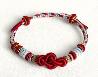 Pulsera de hilo rojo con nudo chino para viajes seguros y buena suerte, regalo espiritual hecho a mano para mujeres, joyería de protección budista ajustable.