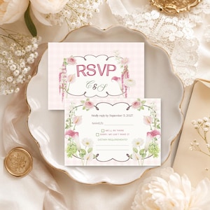 May include: Two rectangular RSVP cards featuring a light pink gingham background, a dark brown decorative frame, and watercolor floral illustrations of pink roses, calla lilies, and white flowers. The text includes RSVP, C & S, and a response form.