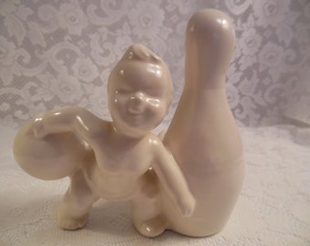 vintage ceramic creamy white planter baby with bowling ball possibly by Haeger American Ceramics - circa 1960s