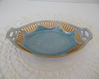 vintage oval shaped light blue lusterware dish with reticulated cut out edging