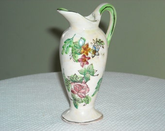 Small ceramic ewer / pitcher with floral design