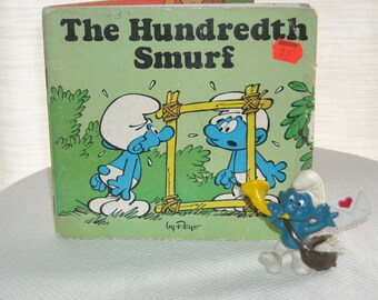 1982 book "The Hundredth Smurf" & 1978 Smurf figurine