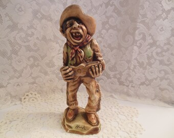 Vintage Singing Cowboy figurine (C) by A. Nuti dated 1938 ceramic vs. chalkware