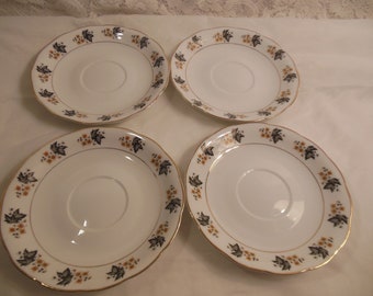 vintage tea cup saucers Set of (4) circa 1970s makers mark unknown Made in China  Pretty little saucers