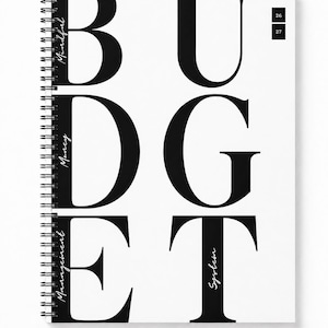 May include: A white spiral-bound notebook with large black letters spelling BUDGET. The word Mindful is written vertically inside the B, Money inside the D, Management inside the E, and System inside the T. Two small black squares contain 26 and 27.
