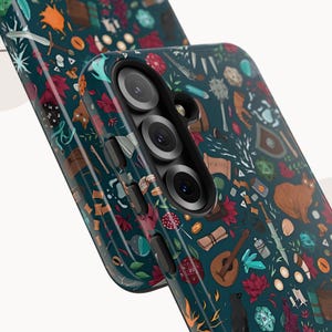 May include: A teal phone case with a repeating pattern of fantasy-themed illustrations. The design includes a brown bear, a black cat, dice, a lute, and various other objects in shades of brown, red, and green.