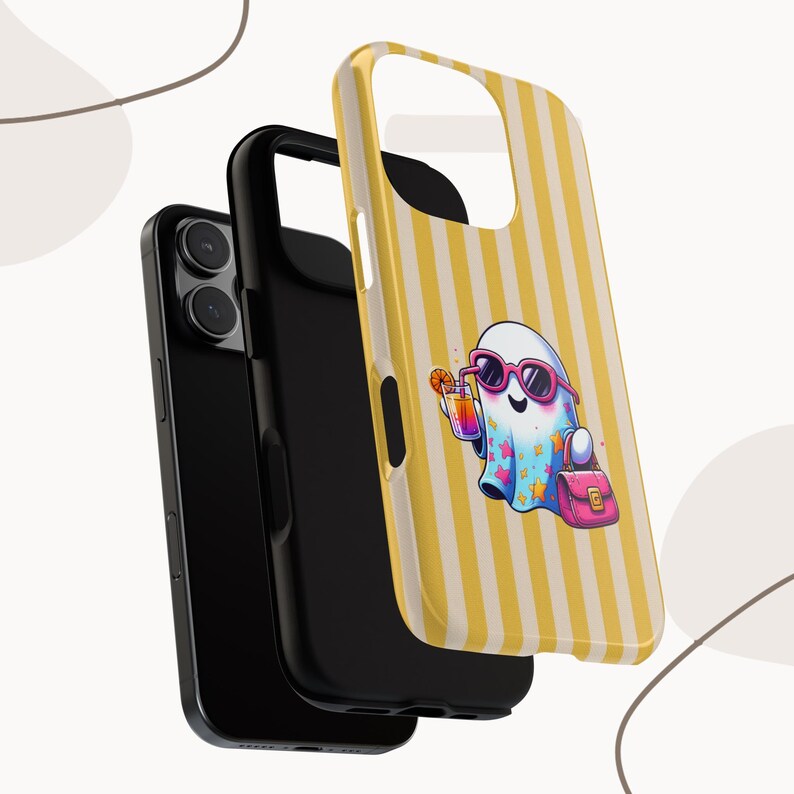 May include: A black phone case with a yellow and white striped phone case cover. The cover features a cartoon ghost wearing sunglasses and holding a cocktail. The ghost is also carrying a pink handbag.