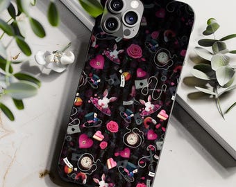 May include: Black phone case with a whimsical Alice in Wonderland design. The case features a repeating pattern of white rabbits, pink roses, hearts, clocks, and top hats. The design is set against a dark background.