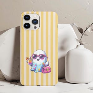 May include: A phone case with a yellow and white striped pattern. It features a cartoon ghost wearing sunglasses, holding a drink and a pink handbag. The ghost is wearing a blue cape with star patterns.