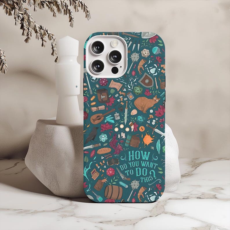 May include: Teal phone case with a whimsical pattern of fantasy-themed illustrations, including a cat, shield, and dice. The case features the text "HOW DO YOU WANT TO DO THIS?" in white. The case has a camera cutout.