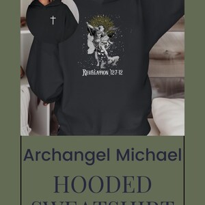 May include: Black hooded sweatshirt with a white graphic of Archangel Michael, a cross, and the text "Revelation 12:7-12".