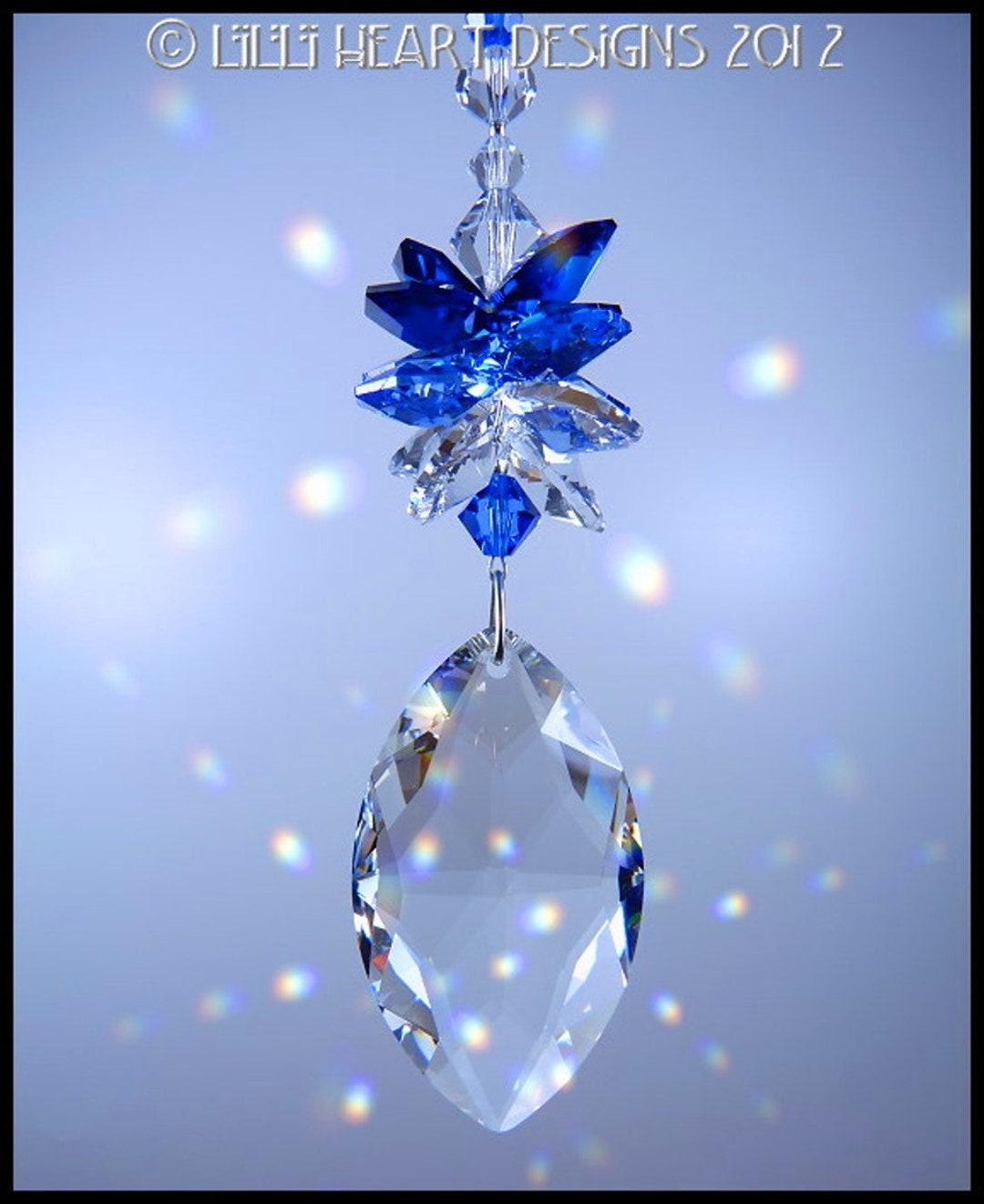 スワロフスキークリスタルサンキャッチャー 50 mm クリアキャッツアイ