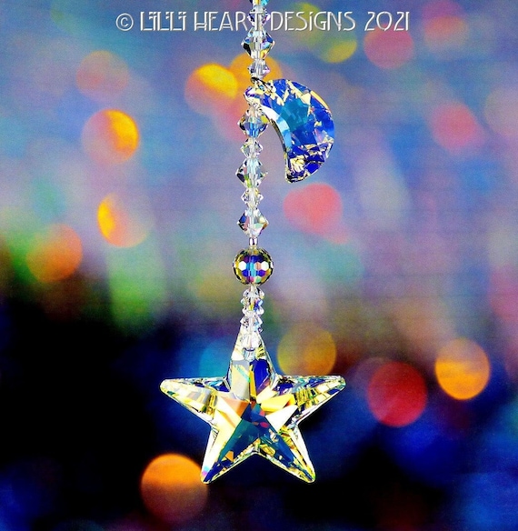 （Swarovski）のクリスタル・フィギュリン「スターブロッサム　希少品 Swarovski Crystal Suncatcher 40mm LARGE Logo Strass Aurora