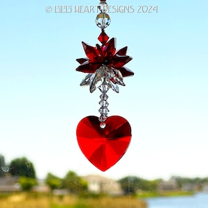 May include: Red crystal heart suncatcher with a red crystal flower design.  © Lili Heart Designs 2024