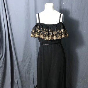 Vintage black and gold long 1970’s ruffle bust dress M