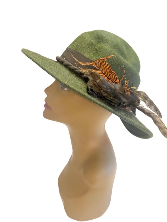 Vintage green fedora hat with feathers