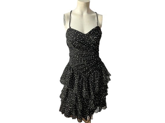 Black polka dot ruffle dress hotsell