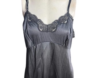 Lencería negra estilo años 70, talla 38.