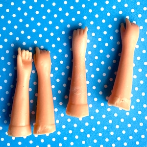 Two sets of Two Rubber Doll Hands 1 7/8 inches long