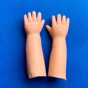 Two Rubber Doll Hands approximately w2 inches long