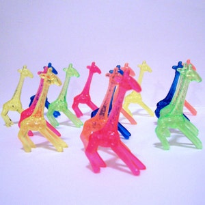 12 Colorful Plastic Giraffe Charms- No Yellow 2” tall