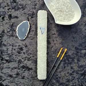 White Quartz - A mezuzah case made of crystal stones offers a luxurious and spiritual touch to a traditional Jewish symbol.