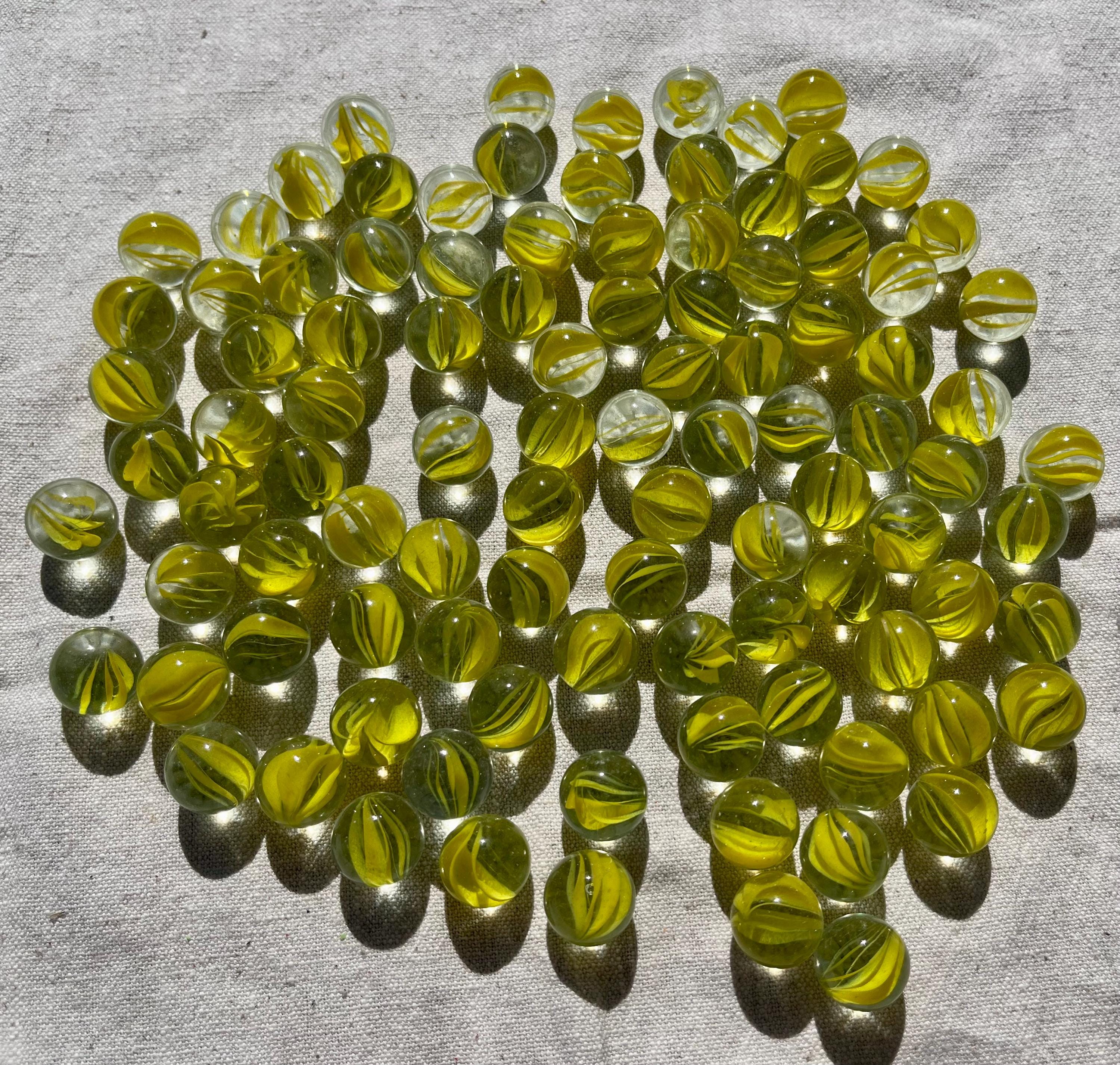 Approx. 95 pieces of glass marbles, marbles clear yellow transparent cat's eyes marble mixture, glass balls, marble game, decoration, vase filling, marble run glass